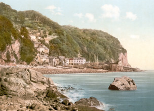 Clovelly Is A Fishing Village On The North-East Coast Of Devon In Great Britain / From The Harbor