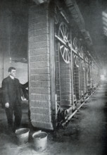 This photo dates to 1922. The caption reads: The match sticks are prepared, dipped in the ignition