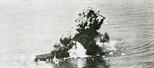 This photo dates to September 5, 1923. The caption reads An 1100-pound bomb explodes alongside. In