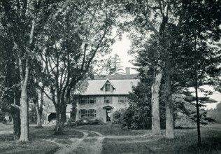 The 1920 caption reads: ""Old Manse in Concord, Massachusetts."" The house is a handsome Georgian