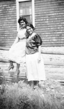 Two Women on Fence