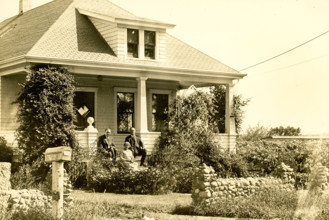 Farmhouse on Plainville Road in New Bedford. This photo dates to around 1915 and shows a house on a