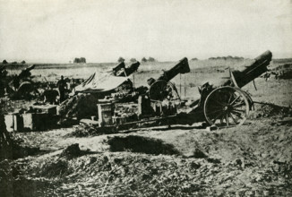 This photo, dating to before 1922, relates to World War I. The caption reads:  Heavy guns at