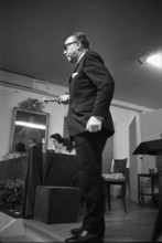 Berne, Galerie Stuker: auctioneer at work; 1966.