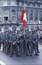 Group wearing historical military uniform.
