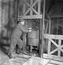 Miner in asphalt mine; 1941.