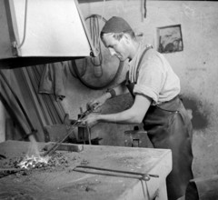Forge, nailer making nails; 1940.
