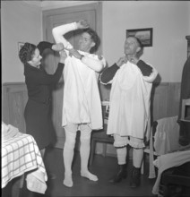 Preparations for Silvesterchlausen in Urnaesch, 1945.