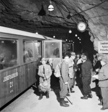 Jungfraujoch 1942: People descending from the Jungfrau train.