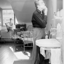 Basle, Hotel drei Konige: Hotel employee having a break.
