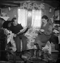 Yenish couple in living room, 1942.