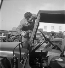 Recruit at introductory course in handling of army Jeep, Thun 1950.