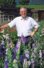 Christoph Blocher in his garden.