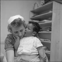 Nurse Erika with Tibetan small child, Waldstatt 1962.