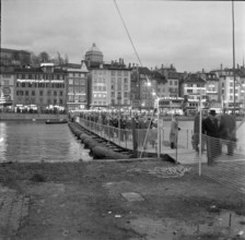 Visitors on Rapid army gangplank across Limmat, Zurich 1957.