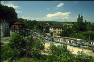 Train BLT at stop, station, 1981.