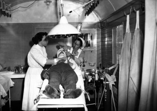 Ambulance coach used as operating room, Bern 1951