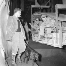 Construction workers in ropeway car, Tierfehd 1959.
