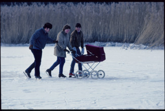Winter 1987: Ice Skating with a pram.
