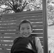 Tibetan child on swing, Unterwasser 1961.