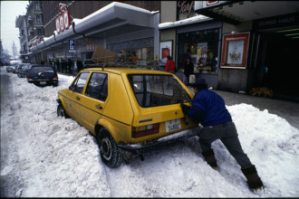 Post car is pushed out of snow, Zurich 1986.