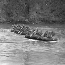 Pontooneers crossing Reuss by rubber dinghy 1956.