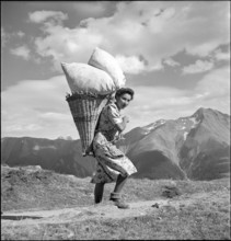 Farmer woman with backpack basket, Bettmeralp 1952.