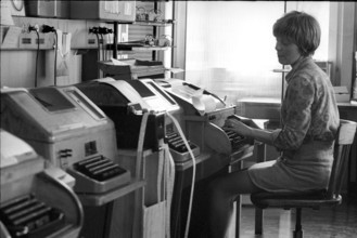 UPI office, telexist at telex terminal, 1970.