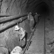 Lobbia power station: clearing tunnel of overburden 1957.