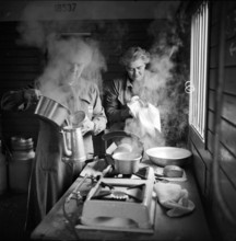Refugee train from Hungary, aid workers in kitchen 1956.