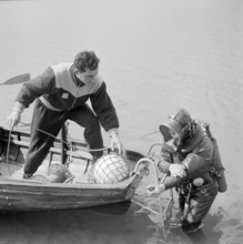 Diver with modern diving suit.