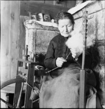 Woman spinning yarn, 1945.