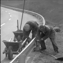 Installing guardrails at road to Gotthard 1961.