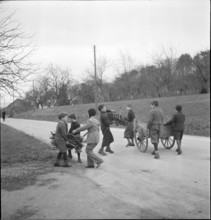 Boys collecting wood in Biel-Benken, circa in 1948.