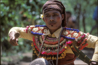 Man doing a folk dance on Lombok island, 1986.