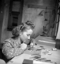 Watch maker in the Cortebert watch factory; 1941.