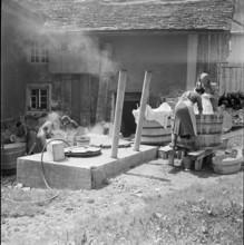 Women washing at the Hinterrhein, 1941.