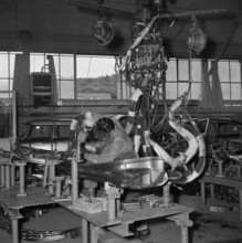 Assembly shop; coachbuilder at work; 1956.