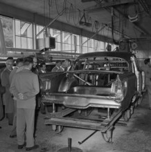 Journalists visiting Assembly shop;  coachwork; 1956.