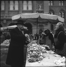 Member of Federal Council J. Escher on the Zibelemarit, Bern 1952.