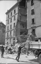 Fire brgade in action at apartment house after explosion, Geneva 1965.