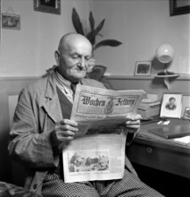 Newspaper Reader with the Wochenzeitung, 1944.