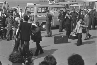 Arrival at Airport Zurich-Kloten in a Swissair DC9; Solzhenitsyn with sons, behind his wife Natalia