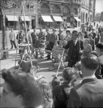Tamer with monkeys: fair on Schutzenmatte, Berne 1949.