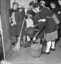 Women of a war fire brigade; 1944.