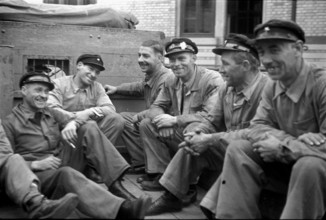 Hurlimann Brewery, drivers, workers having a break; 1941.