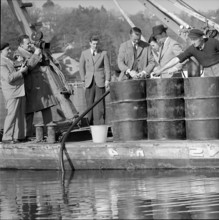 Storage of gasoline tank in Lake Geneva; 1958.