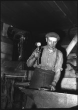 Blacksmith at the Oberaar building site 1950.