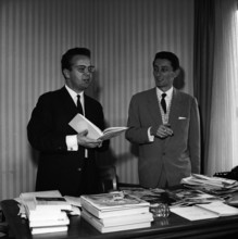 Bernard-Claude Gauthier, chief editor of L'Illustre, with unknown man,1965.