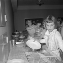 Cookery course for children in Zurich, 1955.